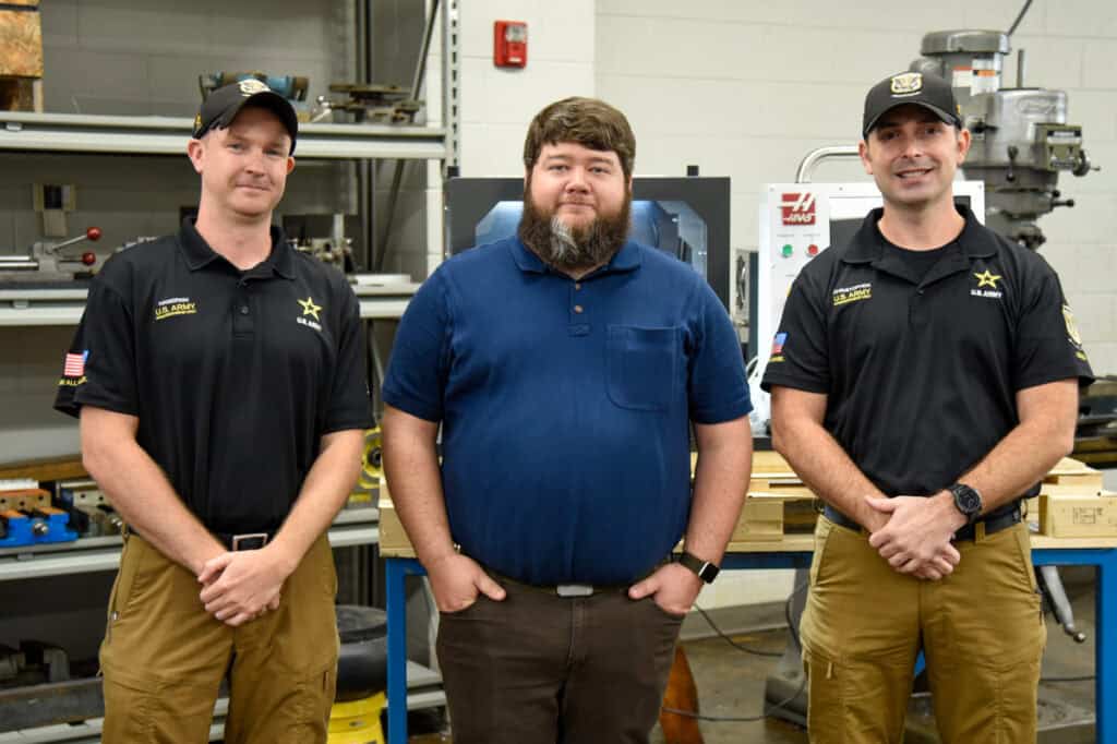 Sergeant First Class Jordan Hamernik (left) and SGTC alumnus Sergeant First Class Stephen Christopher are pictured here with SGTC Precision Machining and Manufacturing instructor Jake Pittman during a recent visit to campus to inform students about career opportunities in the United States Army Marksmanship Unit.