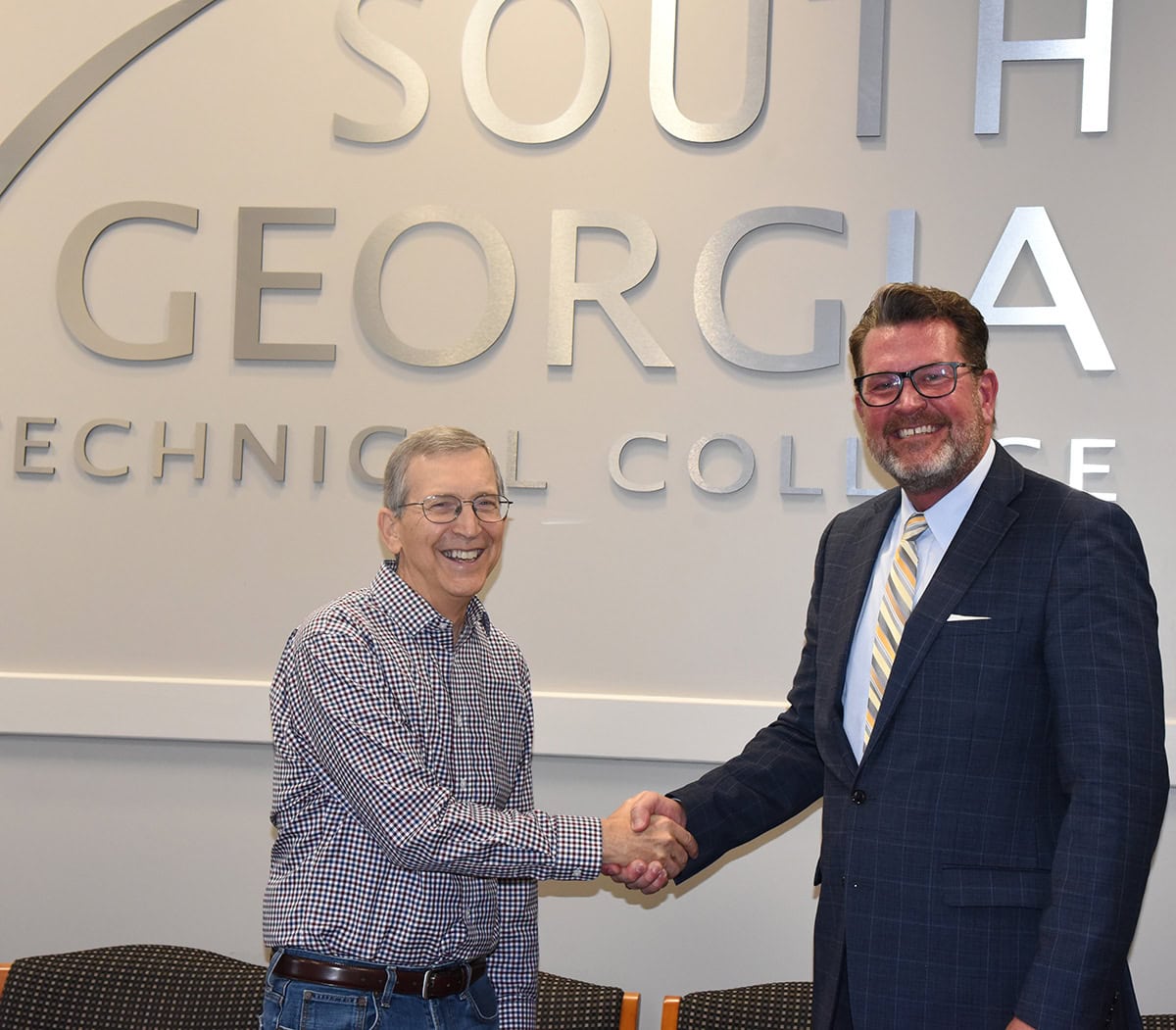 South Georgia Technical College President Dr. John Watford (right) is shown above with Paul Hancock (left) of Ft. Worth, Texas, after talking with him about the new limited term endowed scholarship he established, and giving him a tour of the SGTC Americus campus.