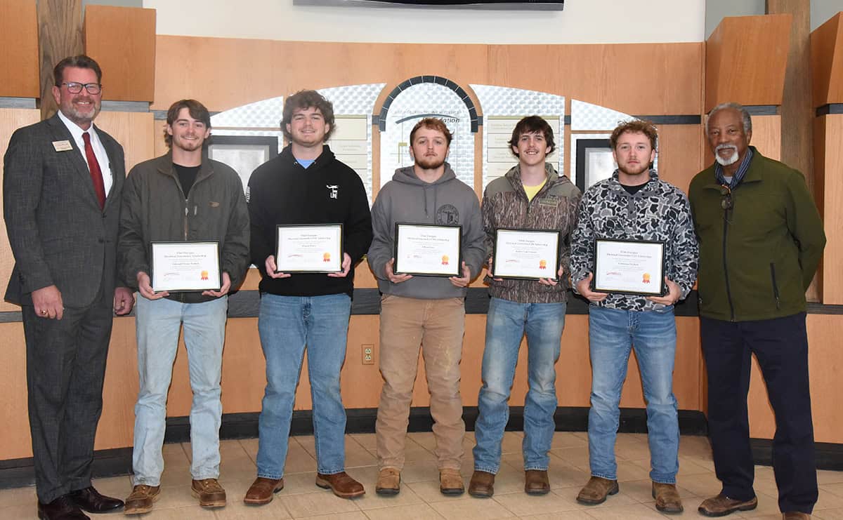 South Georgia Technical College President Dr. John Watford is shown above with the SGTC Electrical Lineworker students who were awarded the Flint Energies scholarships by the SGTC Foundation. Shown (l to r) are: Dr. Watford, Shown above are SGTC Electrical Lineworker students Edward Drake Taunton, Daniel Peavy, Ethan Sims, Bailey Cole Conner, and Christian Prickett with SGTC Electrical Lineworker Instructor Sidney Johnson.