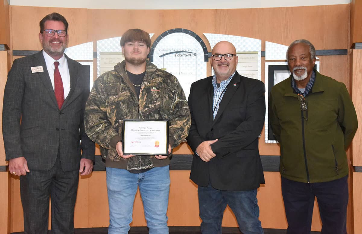 Shown above (l to r) are South Georgia Technical College President Dr. John Watford, SGTC Electrical Lineworker student Mason Stone with his certificate for being named the Georgia Power Scholarship student, Georgia Power Area Manager Keith Nichols, and South Georgia Technical College Electrical Lineworker Instructor Sidney Johnson.