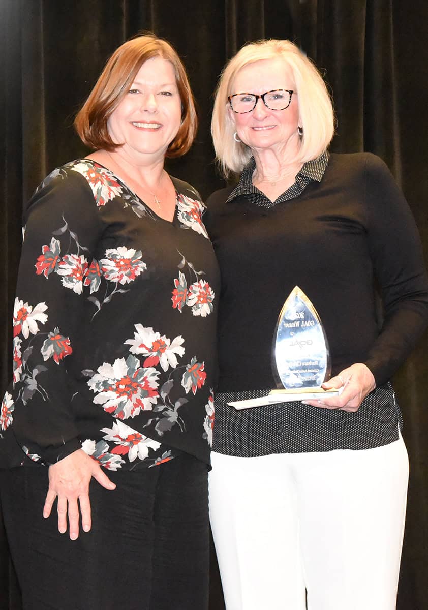 Americus Rotary Club member and Past President Angela Smith (l) is shown above presenting a check from the Rotary Club to Barbara Chestnut (r), who was selected as the SGTC 2025 GOAL student of the year.