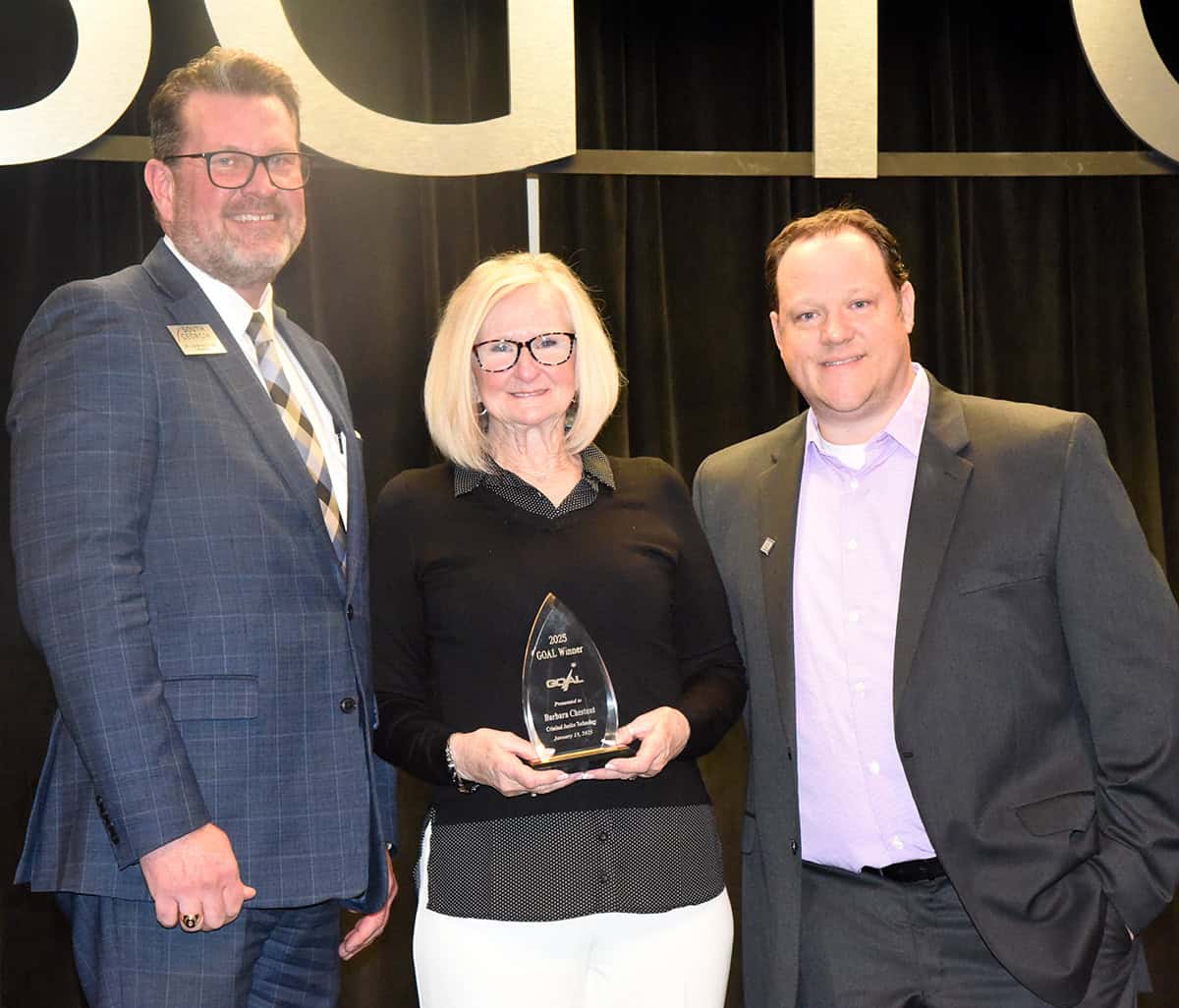 SGTC GOAL winner Barbara Chestnut receives her award from SGTC President Dr. John Watford (left) and Assistant Vice President of Student Affairs Josh Curtin.