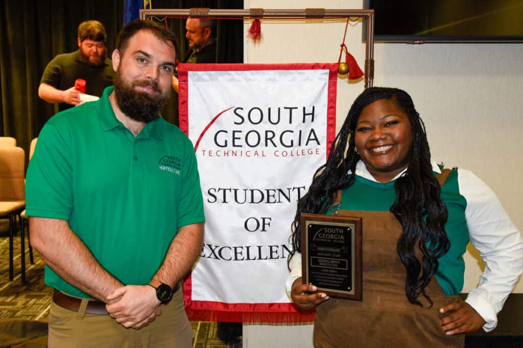 Horticulture student and SGTC Student of Excellence Keinosia Brown (right) is pictured with her nominating instructor, Brandon Gross.